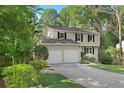 Charming two-story home with a two-car garage and well-maintained landscaping at 4378 Heritage Glen Ct, Marietta, GA 30068