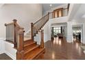 Stunning foyer with hardwood floors and staircase, offering a glimpse into the living spaces at 344 Nottingham Dr, Marietta, GA 30066