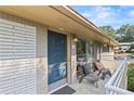 Inviting front porch with seating area and a brick exterior at 3048 Briarcliff Ne Rd # 8, Atlanta, GA 30329