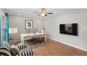 Bright home office with modern desk, decor and television for comfortable working from home at 1594 Pine Glen Cir, Decatur, GA 30035