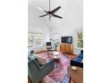 Bright living room with high ceilings, large windows, and modern furnishings at 747 Dill Sw Ave, Atlanta, GA 30310