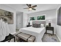 Serene main bedroom with natural light, neutral decor, a ceiling fan, and comfortable furnishings at 2991 Catalina Dr, Decatur, GA 30032