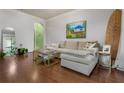 Well-lit living room with hardwood floors and neutral decor at 3777 Peachtree Ne Rd # 1112, Brookhaven, GA 30319