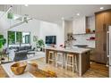 Spacious open concept kitchen and living room with a large island and modern appliances at 536 Highland Ne Ave # A, Atlanta, GA 30312
