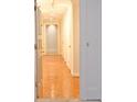 Hallway with hardwood floors with access to multiple rooms at 2734 Peachtree Nw Rd # C-404, Atlanta, GA 30305