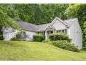 Charming home with two-car garage and well-maintained landscaping at 245 London Ln, Hiram, GA 30141