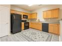 Well-equipped kitchen featuring modern appliances and plenty of cabinet space at 7432 Battlecreek Ln, Jonesboro, GA 30236