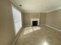A cozy living room with tile flooring and a decorative fireplace with a white mantel at 3116 Leyland Ct, Decatur, GA 30034