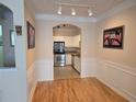 Inviting dining room with hardwood flooring, and kitchen access at 1850 Cotillion Dr # 2204, Atlanta, GA 30338