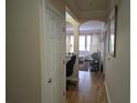 Open hallway leads to a bright living room with hardwood floors at 1850 Cotillion Dr # 2204, Atlanta, GA 30338