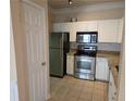 Well-equipped kitchen features stainless steel appliances and granite countertops at 1850 Cotillion Dr # 2204, Atlanta, GA 30338