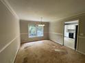 Dining room with a large window at 3840 Whitaker Ln, Lithia Springs, GA 30122