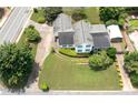 Aerial view of home with mature landscaping and detached carport at 2692 Wellington Dr, Marietta, GA 30062