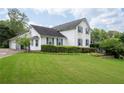Beautiful two-story home with lush green lawn and well-maintained landscaping at 2692 Wellington Dr, Marietta, GA 30062