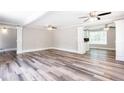 Spacious living room with wood floors, and lots of natural light at 1916 Highway 138 Sw, Conyers, GA 30094