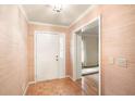 Inviting foyer with parquet flooring and textured walls, leading to the rest of the home at 170 Mayfield Cir, Alpharetta, GA 30009