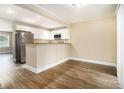 Modern kitchen with stainless steel appliances, granite countertops, and a breakfast bar at 2912 Springside Se, Atlanta, GA 30354