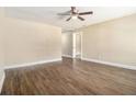 Bright living room with attractive floors, a ceiling fan, and neutral wall colors at 2912 Springside Se, Atlanta, GA 30354