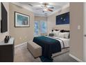 Comfortable bedroom with a large bed, soft carpet, and natural light, creating a relaxing atmosphere at 1850 Cotillion Dr # 3305, Dunwoody, GA 30338