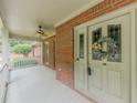 Spacious covered front porch with double doors and a decorative wreath at 3290 Spain Rd, Snellville, GA 30039