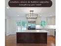 Bright kitchen with a large island, stainless steel refrigerator, and white cabinetry at 1850 Donald Dr, Marietta, GA 30062
