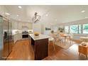 Spacious eat-in kitchen with stainless steel appliances, stylish island and adjacent dining area at 1850 Donald Dr, Marietta, GA 30062