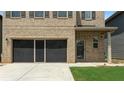 Garage door with screen in front of 2 car garage at 11684 Stovall Place Pl, Hampton, GA 30228