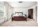 Spacious main bedroom with large windows, plush carpet, and elegant furnishings at 1216 Virginia Ne Ct # 8, Atlanta, GA 30306