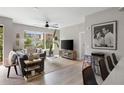 Bright living room with large windows, stylish furniture, and ample natural light at 22 Airline Ne St # 201, Atlanta, GA 30312