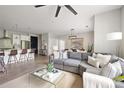 Spacious living room featuring a comfortable sectional sofa and an open view of the kitchen at 22 Airline Ne St # 201, Atlanta, GA 30312