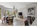 Bright living room with large windows, stylish furniture, and contemporary décor at 22 Airline Ne St # 201, Atlanta, GA 30312