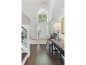 Bright foyer with hardwood floors, high ceilings, and a large window framing the outdoor view at 3065 Foxhall Overlook, Roswell, GA 30075