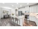 Modern kitchen with stainless steel appliances, granite countertops, and an open island with seating at 791 Belrose Dr, Smyrna, GA 30080