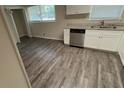 Efficient kitchen with stainless steel appliances and sleek countertops at 1026 Eisenhower Se Ct, Atlanta, GA 30354