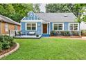 Quaint two-story home with a charming front porch, well-maintained lawn, and cozy curb appeal at 1136 Moreland Se Pl, Atlanta, GA 30316