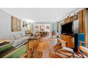 Spacious living room with an open layout, hardwood floors, and an adjacent dining area at 1736 Morris Landers Ne Dr, Atlanta, GA 30345