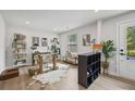 A spacious office with a workstation, natural light, and a cozy decor at 125 Climbing Ivy Cir, Fayetteville, GA 30214
