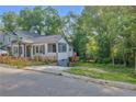 Quaint home with a screened in porch and access to a private backyard at 845 Oak Nw St, Atlanta, GA 30318