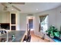 Bright kitchen featuring an island with bar seating and modern lighting, and a view into the living space at 1809 Brandi Ln, Loganville, GA 30052
