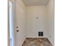Bright foyer with neutral walls and tiled flooring, leading to other parts of the home at 4398 Stonebridge Ct, Duluth, GA 30096