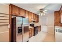 Well-lit kitchen featuring a full suite of appliances and classic cabinetry at 1739 Brandy Woods Se Trl, Conyers, GA 30013