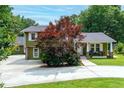 Beautiful home exterior with a well-manicured lawn and inviting curb appeal at 3778 Berdon Ln, Decatur, GA 30034