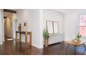 Open-concept with rich dark hardwood floors, neutral color scheme, and lots of natural light at 996 Palmetto Sw Ave, Atlanta, GA 30314