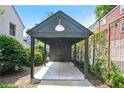 A well-maintained carport providing covered parking, blending seamlessly with the property's architecture at 67 Delmont Ne Dr, Atlanta, GA 30305