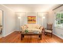Inviting living room with hardwood floors, neutral walls, and classic decor elements at 3880 Admiral Dr, Chamblee, GA 30341