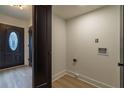 Convenient interior laundry room with washer/dryer hookups at 2859 Spring Villa Se Ln, Smyrna, GA 30080