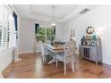 Bright dining room featuring hardwood floors and stylish decor at 203 Belmont Park Dr, Canton, GA 30115