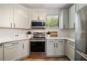 Modern kitchen featuring stainless steel appliances, light countertops, and white subway tile backsplash at 821 Ralph Mcgill Ne Blvd # 2219, Atlanta, GA 30306
