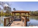 Scenic wooden gazebo overlooking the lake with seating at 1800 Clairmont Lk # A226, Decatur, GA 30033