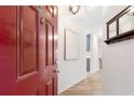 Inviting entryway with a classic red door and modern decor at 2700 Pine Tree Ne Rd # 2201, Atlanta, GA 30324